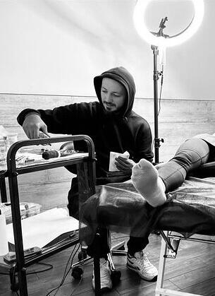 Tattoo artist Igor Vtoroff during a session in Torrevieja studio, Alicante, Spain
